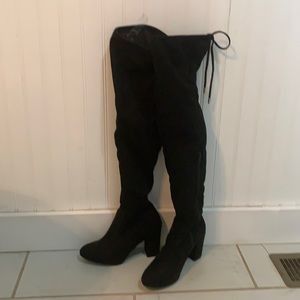 Thigh high black suede boots